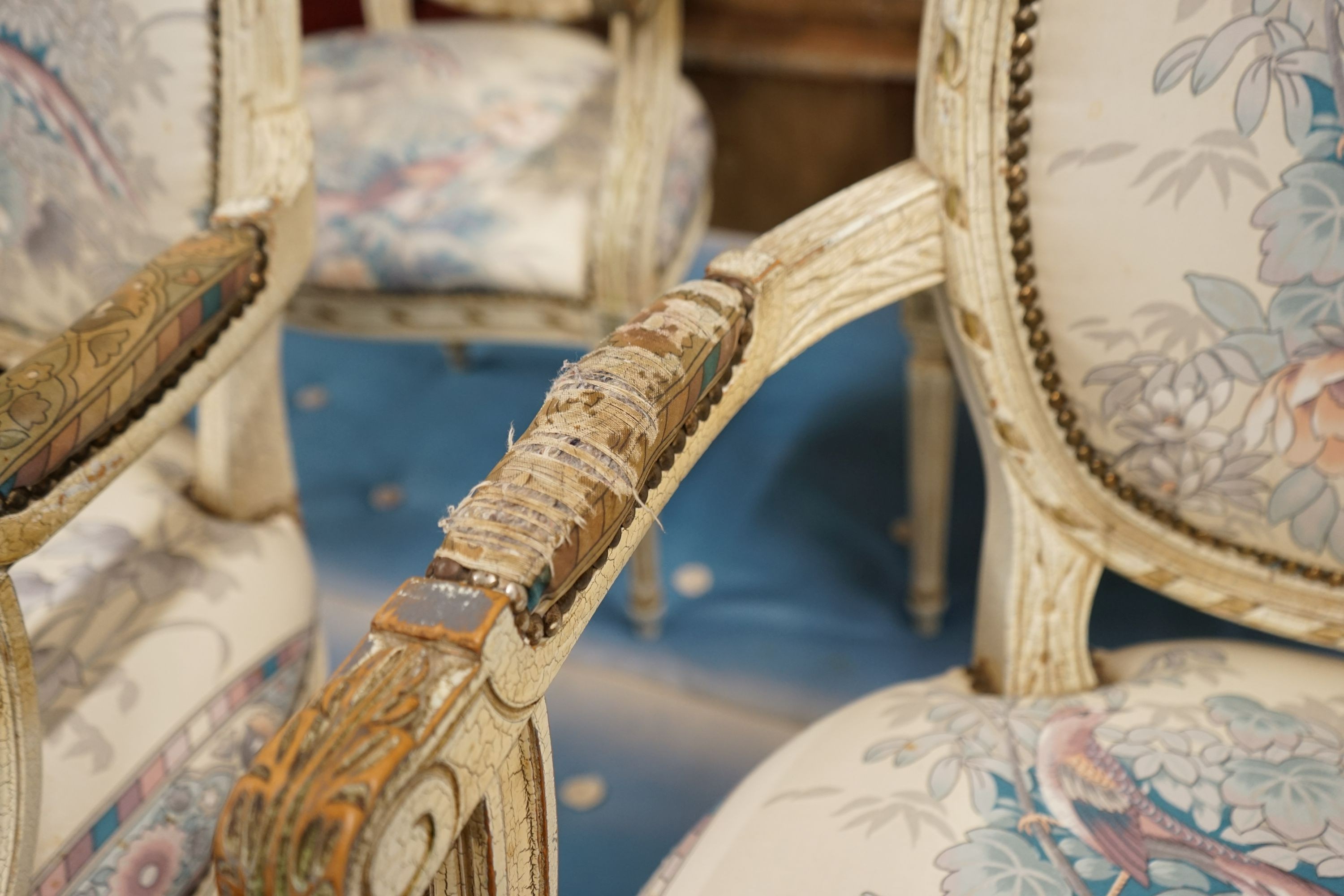 A set of four painted open armchairs, width 59cm, depth 50cm, height 95cm